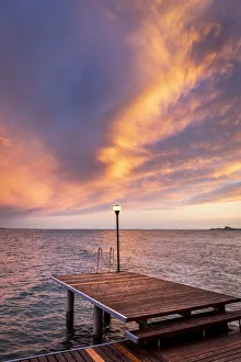Garda Lake Prints: Western side of Garda lake during a cloudy sunset. Toscolano Maderno, Brescia Province