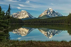 Whirlpool Peak (L) and Mt, Fryatt( R) reflected in Leech Lake, Jasper National Park, Alberta, Canada