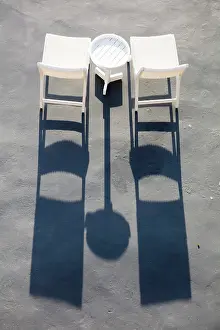 Shadows Prints: White chair and shadows, Imerovigli, Santorini, Cyclades Islands, Greece, Europe