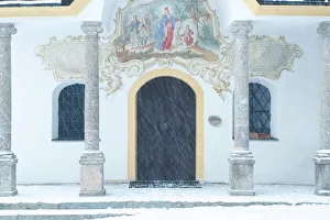 Tiroler Prints: The white facade of Heiligwasser Church on a snowy day, Igls, Innsbruck, Tyrol, Austria