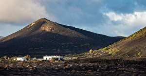 Volcanic Landscape Prints: White house in the volcanic landscape, La Geria, Lanzarote, Canary Islands, Spain