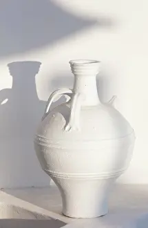 Shadow Prints: White urn with shadow on white wall, Oia, Santorini, Cyclades Islands, Greece, Europe