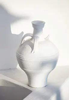 Shadow Prints: White urn with shadow on white wall, Oia, Santorini, Cyclades Islands, Greece, Europe