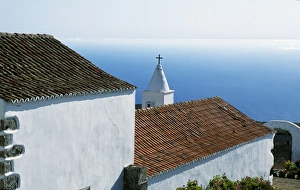 Church Tower Gallery: The whitewashed Church of Senora de los Reyes