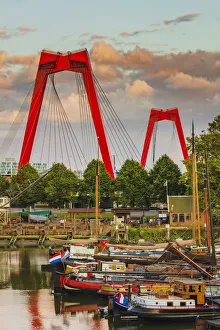 Willemsbrug bridge at sunset with boats in Oudehaven, Holland / Netherlands
