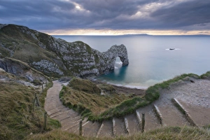 Winding coastpath steps leading down to Durdle Door on the Jurassic Coast, Dorset, England Winding coastpath steps leading down to Durdle Door on the Jurassic Coast, Dorset, England