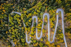 Winding road to Cheggio and Lago dei Cavalli in autumn. Alpe Cheggio, Antrona Valley, Piedmont, Verbano Cusio Ossola