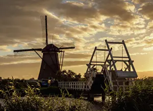 Windmill in Kinderdijk at sunset, UNESCO World Heritage Site, South Holland