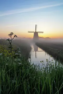 North Holland Prints: A windmill at sunrise, North Holland, Netherlands