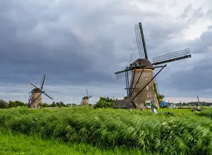 Polder Prints: Windmills in Kinderdijk at dusk, UNESCO World Heritage Site, South Holland