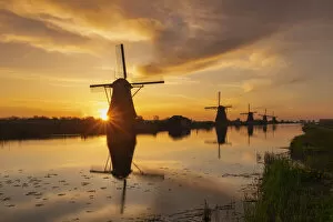Images Dated 24th May 2022: Windmills of Kinderdijk at Sunrise, Holland, Netherlands