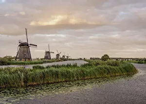 Images Dated 3rd August 2017: Windmills in Kinderdijk at sunset, UNESCO World Heritage Site, South Holland, The