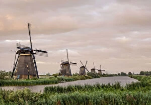 Open Air Museum Gallery: Windmills in Kinderdijk at sunset, UNESCO World Heritage Site, South Holland, The