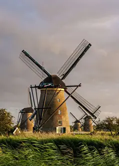 Windmills in Kinderdijk at sunset, UNESCO World Heritage Site, South Holland