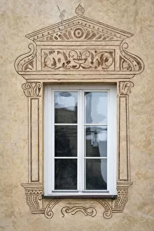 Detail of window and painted facade of house, Ceske Budejovice, South Bohemian Region, Czech Republic