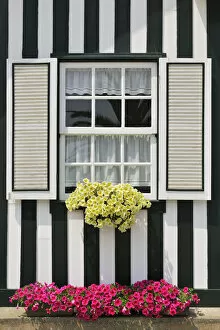 Images Dated 12th September 2014: Window of a traditional striped painted house in the little seaside village of Costa Nova