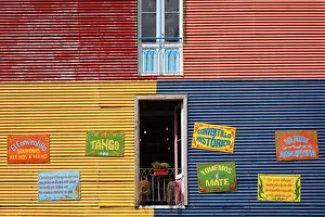Windows of a colorful bar in the Caminito de La Boca'with wall decorations in Fileteado Art, Buenos Aires, Argentina