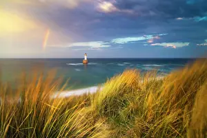 Dunes Prints: Windy sunset at Rattray Head Lighthouse, Buchan, Aberdeenshire, Scotland, United Kingdom