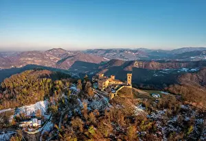 Piedmont Prints: Winter aerial view of the castle San Lorenzo in the Alessandria hills at sunset