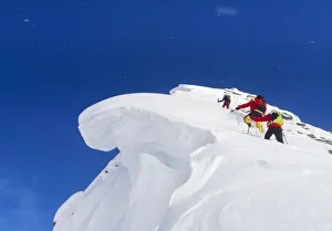 Alpinism Prints: Winter alpinists at Roger pass, British Columbia, Canada