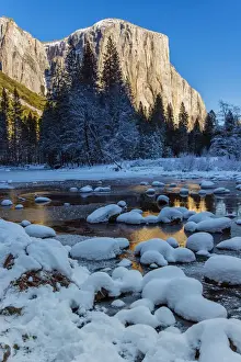 Winter landscape with iced river and El Capitan mountain behind, Yosemite National Park