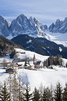 Ski Resort Prints: Winter landscape of St. Magdalena village and church, Geisler Spitzen (3060m), Val