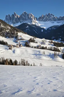 Ski Resorts Prints: Winter landscape of St. Magdalena village and church, Geisler Spitzen (3060m), Val