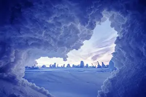 Creativity Prints: Winter scenery at dusk view from opening of an ice cave in shape of a heart