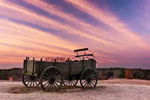 Wagon Prints: Winter sunrise over old farm wagon at Wagon Hill Farm, Durham, New Hampshire, USA