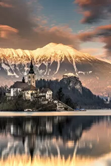 Balkans Collection: Winter sunset over Church of the Assumption of Mary, Lake Bled, Upper Carniola, Slovenia