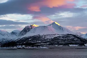 Majestic Prints: Winter sunset over the icy waters of Balsfjord and snowy peaks of Lyngen Alps
