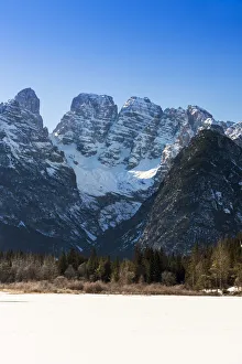 Winter view of frozen Lago di Landro or Durrensee lake with Cristallo mountain group Winter view of frozen Lago di Landro or Durrensee lake with Cristallo mountain group