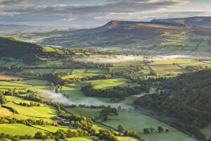 Wales Collection: Wisps of mist float over the Usk Valley on an autumnal morning, Brecon Beacons, Powys
