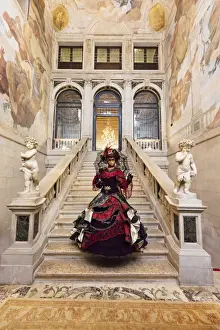 Lavish Prints: Woman in costume standing on staircase in Ca Segredo palace during Carnival, Venice