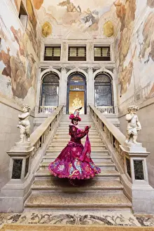 Staircase Prints: Woman in costume standing on staircase in Ca Segredo palace during Carnival, Venice