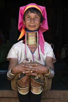 Necklaces Collection: Woman from Kayan tribe wearing traditional brass neck rings, near Loikaw District