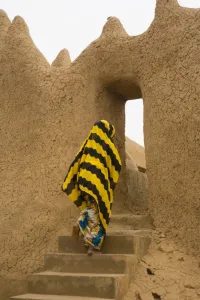 Mali Prints: Woman outside Mud Mosque in Segoukoro, Segou, Mali