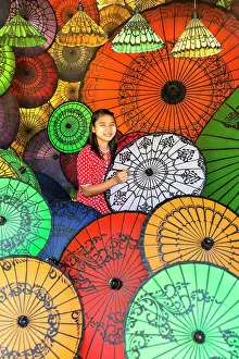 Painting Prints: Woman painting colourful parasols, Bagan, Myanmar (Burma), Asia