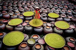 Factory Prints: Woman processing soybeans for traditional soy sauce, Hanoi, Vietnam. (MR)