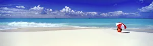 Woman with Red & White Umbrella on beach, Barbuda, Caribbean, West Indies