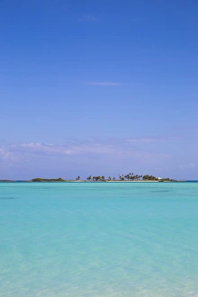 Woman on sandbank, Rasdhoo Island, Northern Ari Atoll, Maldives (MR)