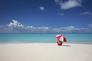 Umbrella Gallery: Woman Sitting on Beach with Red & White Umbrella, Barbuda, Caribbean, West Indies