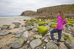 Isle Of Lewis Prints: Woman staring at Dailbeag beach, Isle of Lewis, western scotland, United Kingdom