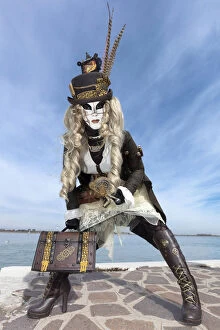 Woman in Steampunk costume posing during Carnival on Burano Island, Venice, Veneto, Italy