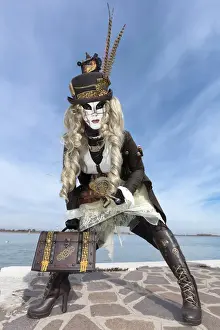 Brown Prints: Woman in Steampunk costume posing during Carnival on Burano Island, Venice, Veneto, Italy