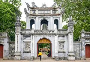 Viet Nam Prints: Woman walking through gate at Temple of Literature, Dong Da District, Hanoi, Vietnam