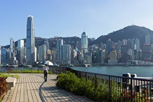 West Kowloon Prints: Woman walking on M+ Museum rooftop, West Kowloon Cultural District, Kowloon, Hong Kong