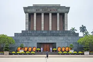Viet Nam Prints: A woman walks past Ho Chi Minh Mausoleum on Ba Dinh Square, Hanoi, Vietnam