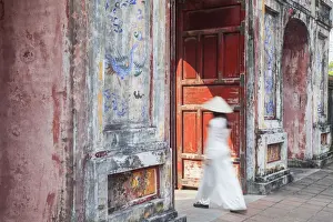 1 Person Prints: Woman wearing Ao Dai dress at Dien Tho inside Citadel, Hue, Thua Thien-Hue, Vietnam (MR)