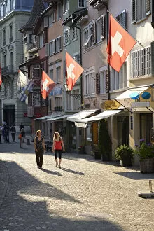 Images Dated 4th October 2013: Two women walking in Augustinergasse, Zurich, Switzerland, Europe